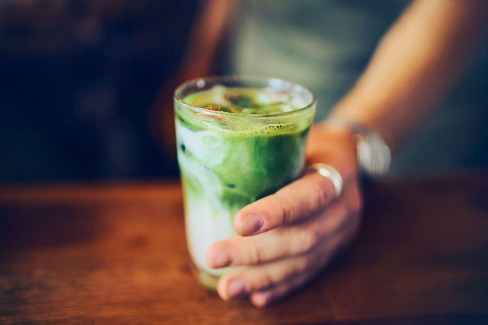 Iced matcha latte, slow stirred, served the way summer asks for it